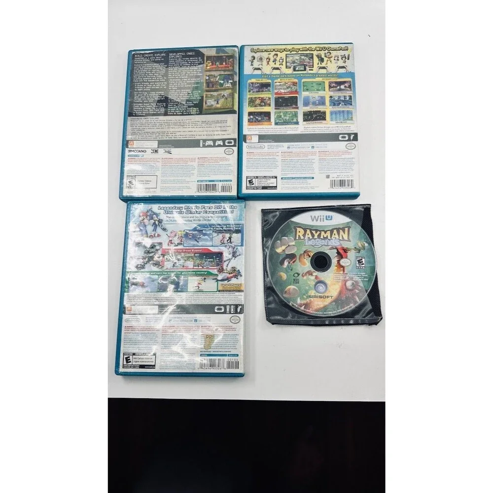Wii U Game Lot of 4 - Nintendo Land, Minecraft, Rayman Legends, Mario & Sonic Ol